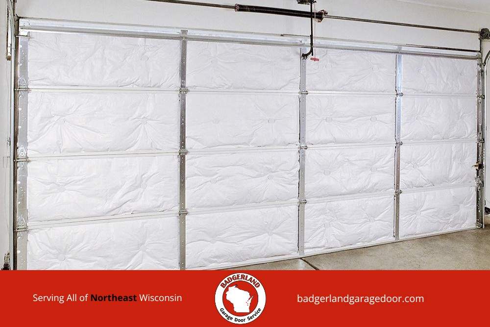 Insulated garage door panels showing weatherproofing work Badgerland Garage Door provides for Wisconsin homeowners in winter.