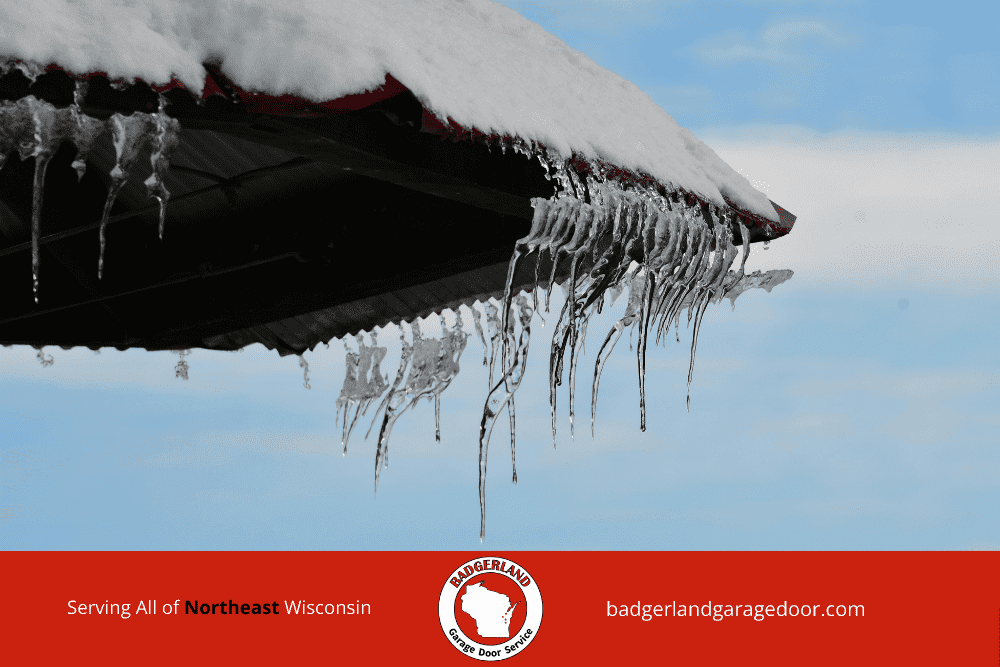 Icicles forming above garage can contribute to frozen doors and ice buildup. Badgerland Garage Door Service.