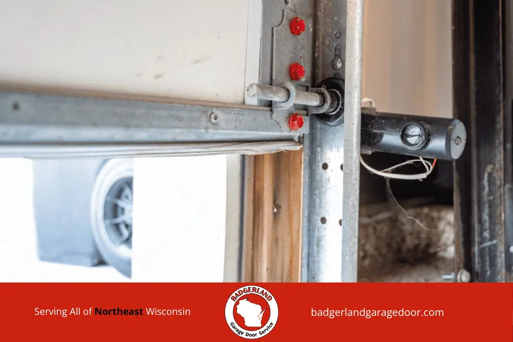 Garage door maintenance in winter to keep families safe and equipment protected. Badgerland Garage Door Service.