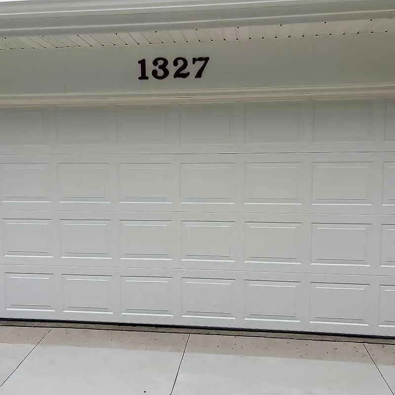 White garage door with the number 1327 above, suitable for garage door repair in Green Bay and Appleton areas.| Badgerland Garage Door Service – Green Bay Garage Door Repair